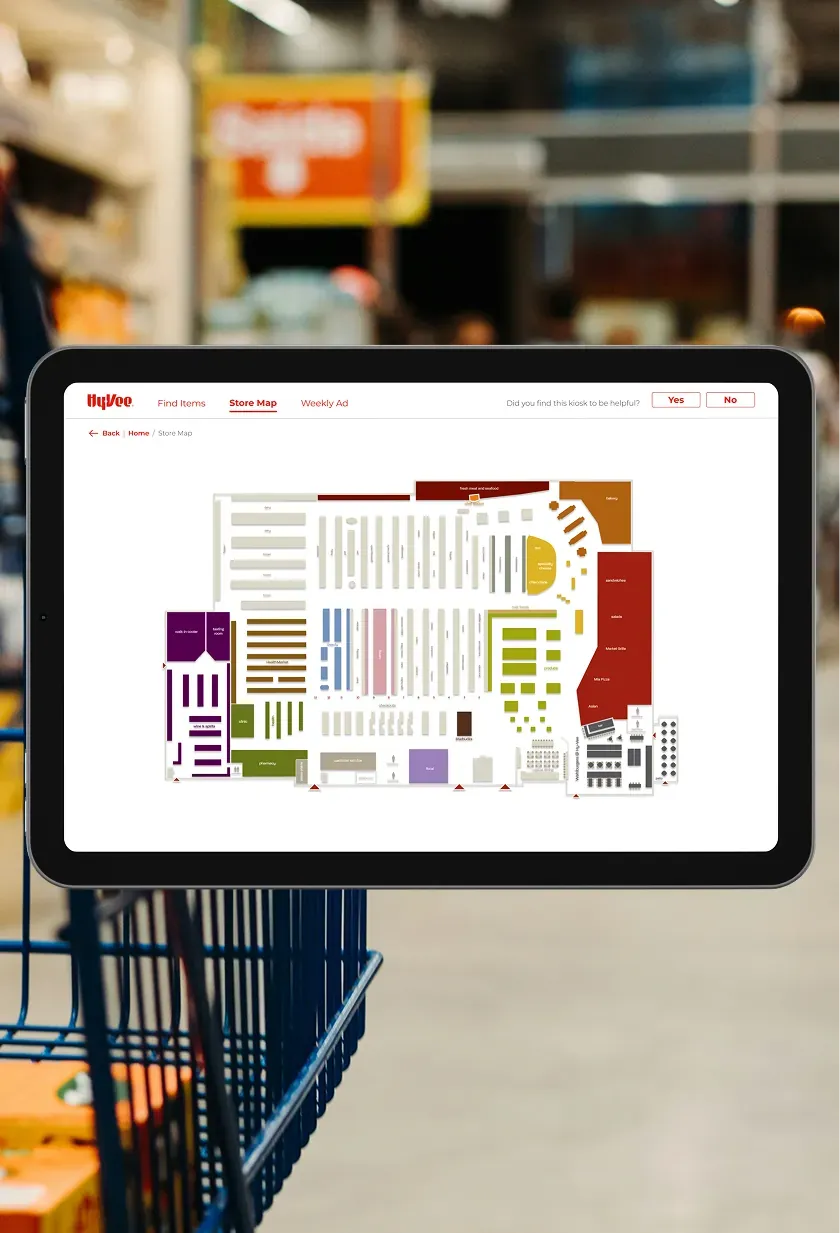 A Hy-Vee kiosk store map showing the aisles and departments in color.