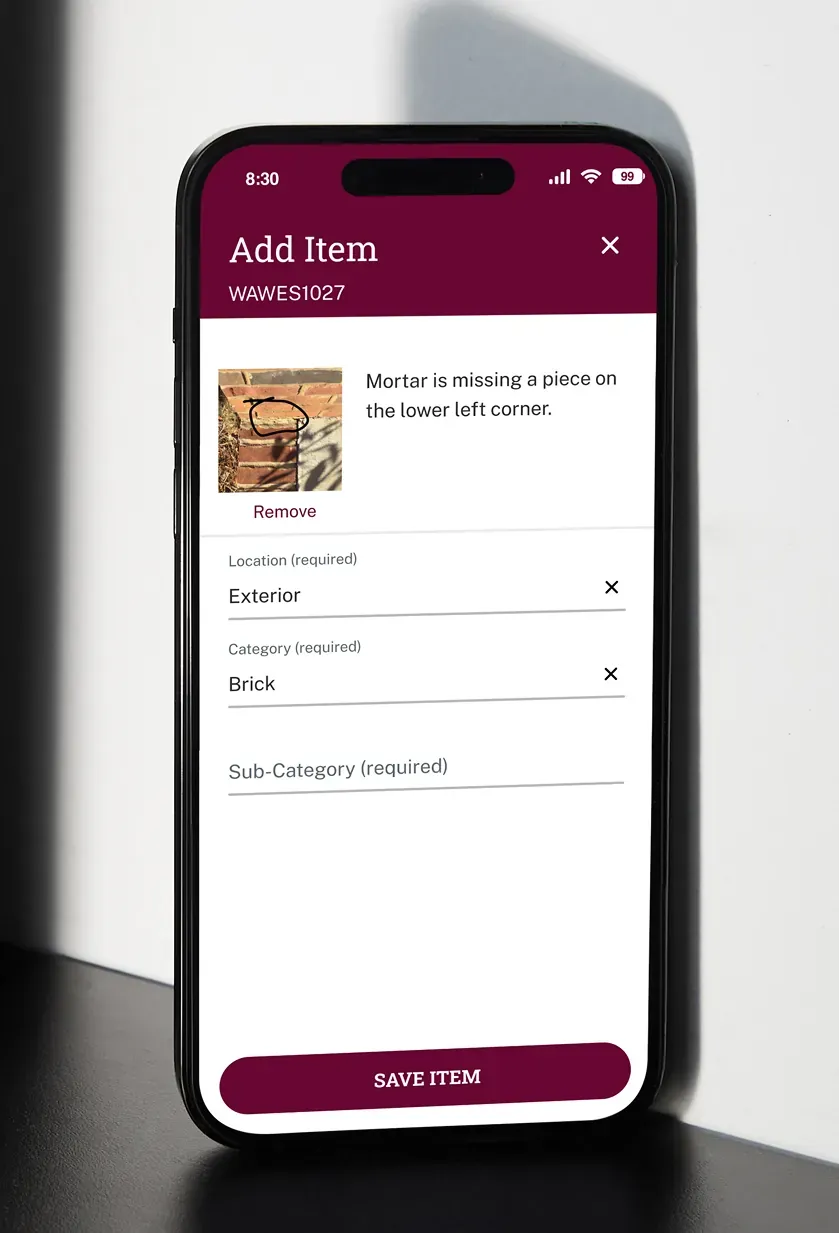 The Add Item screen filled in with a photo of an exterior brick issue.