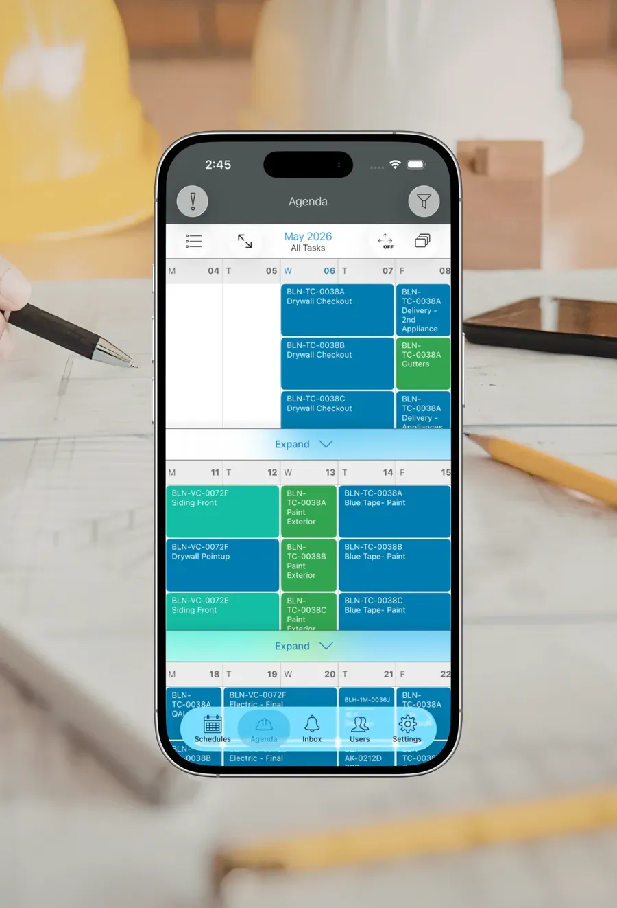 The Schedule Pro agenda, a weekly calendar of color-coded construction tasks.