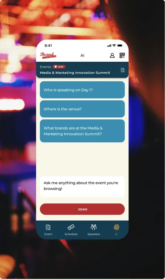 The AI chat with suggested questions about who is speaking and where the venue is.