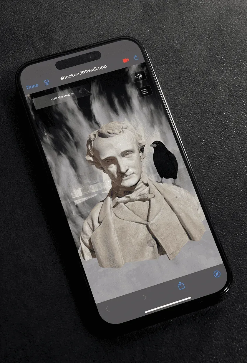 The animated bust of Edgar Allan Poe with a raven on his shoulder, shown on a phone.