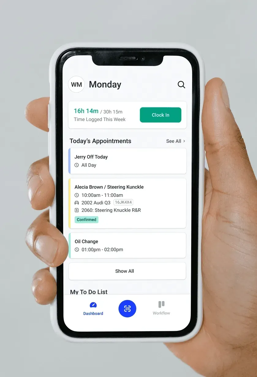The Shopmonkey app dashboard with a time clock and today's appointments.