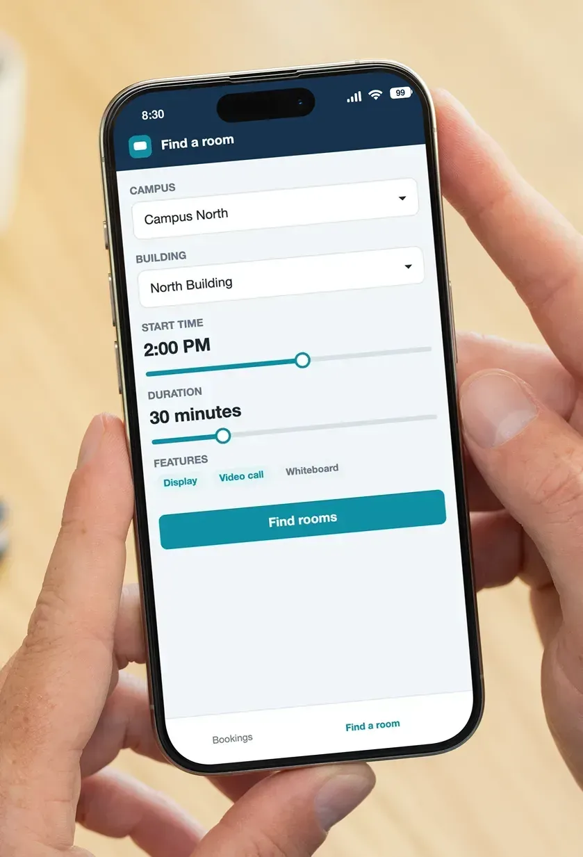A phone showing the Find a room screen with campus and building pickers, time sliders and feature filters.