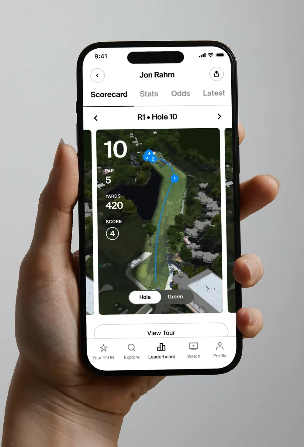The scorecard screen with a 3D aerial map of a par 5 hole, showing yardage, score, and the path of each shot.