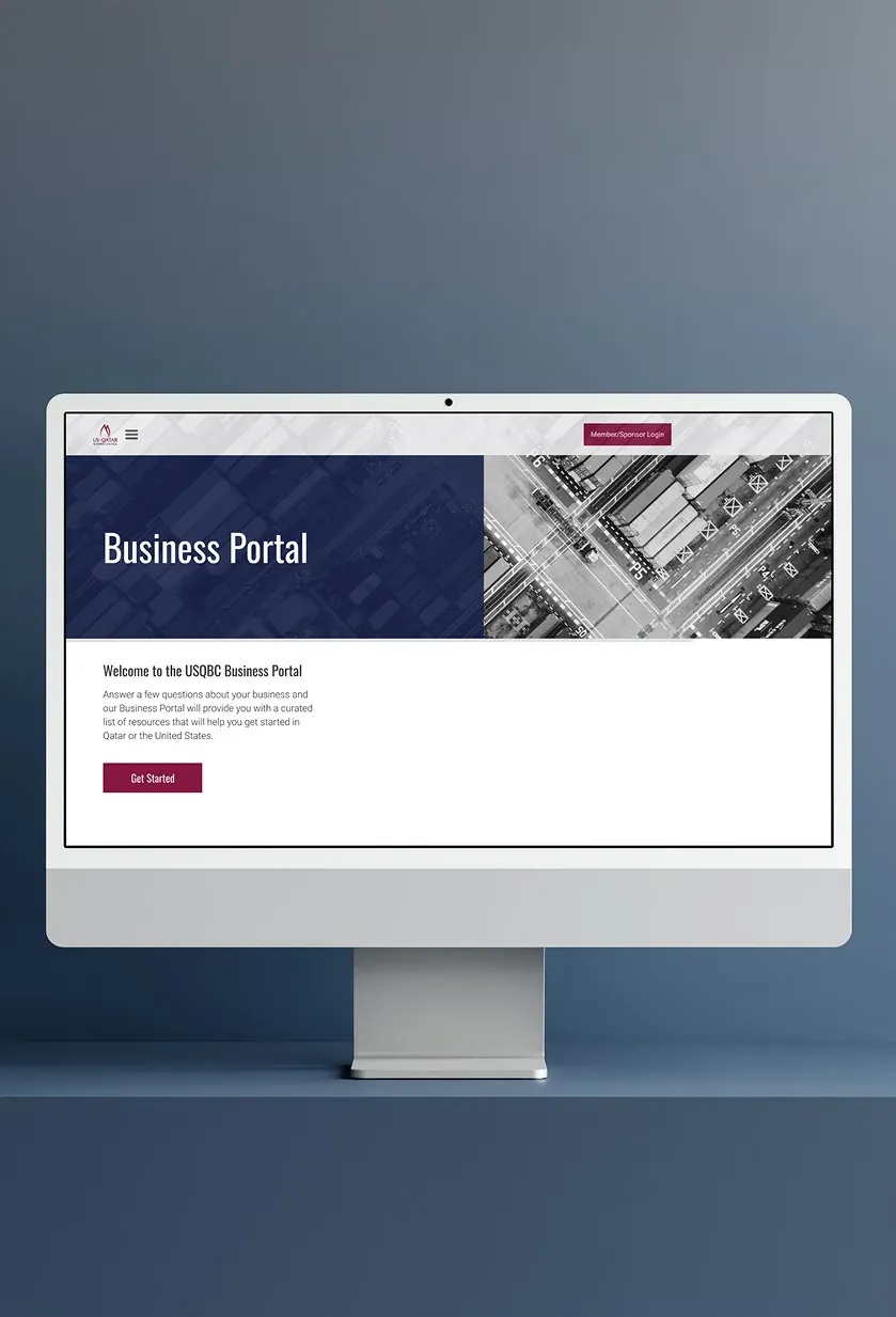 The Business Portal welcome page on a desktop monitor, inviting visitors to answer a few questions and tap Get Started.