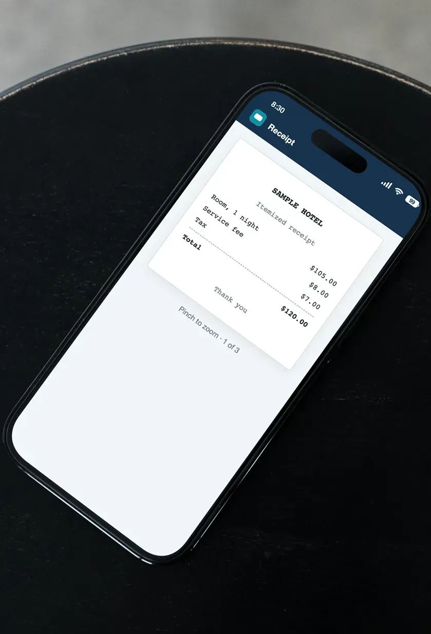 A phone showing a single itemized receipt full screen with a zoom hint.