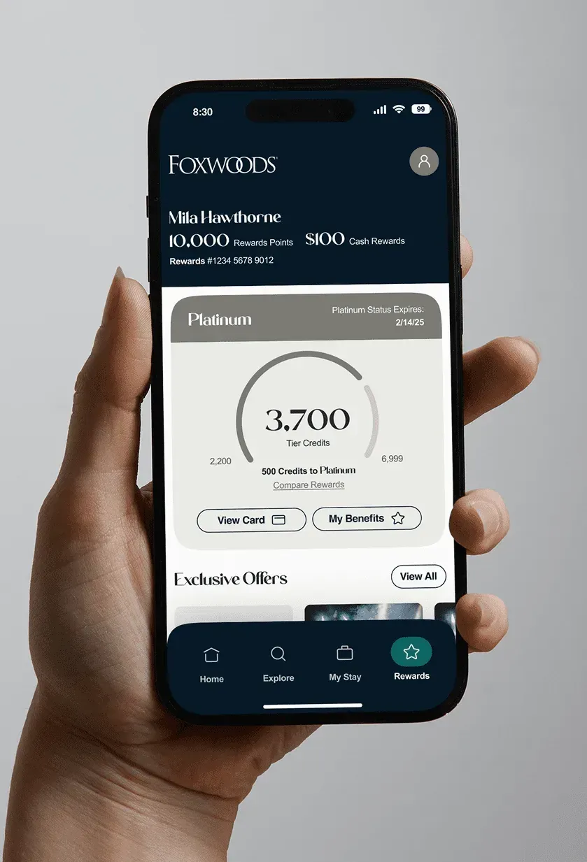 The mobile app's rewards screen showing a tier, a credit total, and exclusive offers.