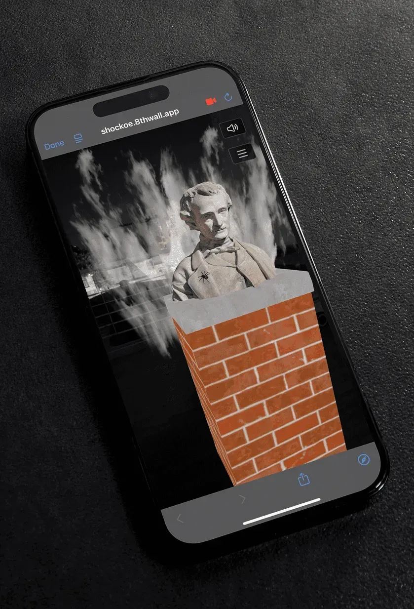 Smoke swirling around Poe's bust in the augmented reality view on a phone.