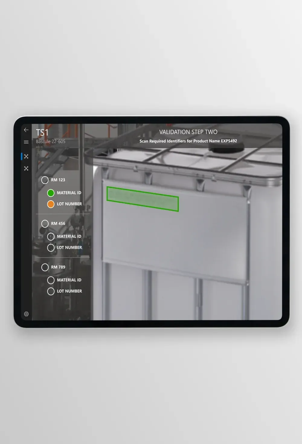 A validation step on a tablet where the camera view of a material container highlights the label to scan, with a checklist of material ID and lot number for each raw material.